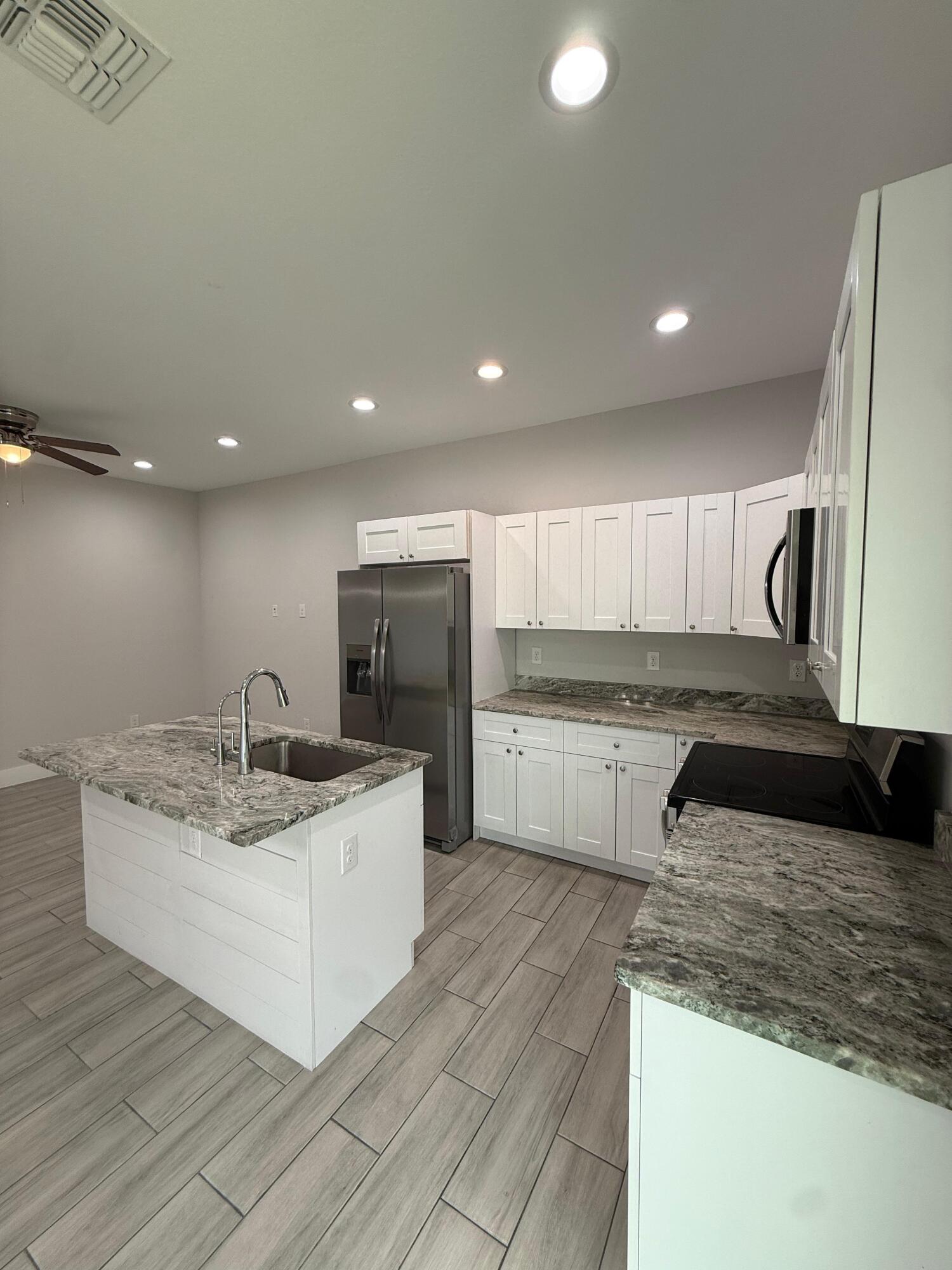 4800 15th Street Southwest Lehigh Acres, FL 33973 - Photo 11 of 37 PHOTO-2026-03-08-15-21-29