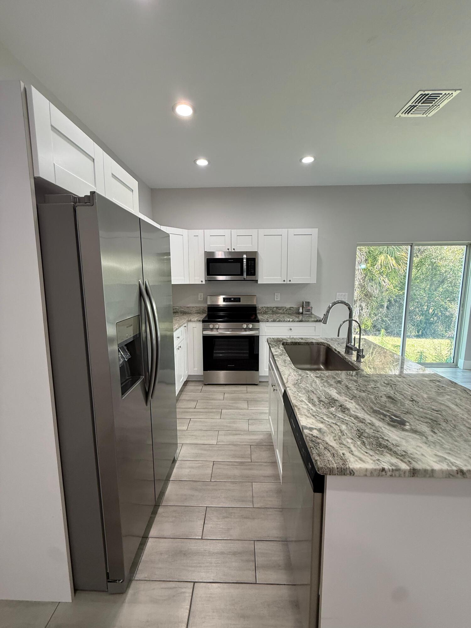 4800 15th Street Southwest Lehigh Acres, FL 33973 - Photo 13 of 37 PHOTO-2026-03-08-15-21-31