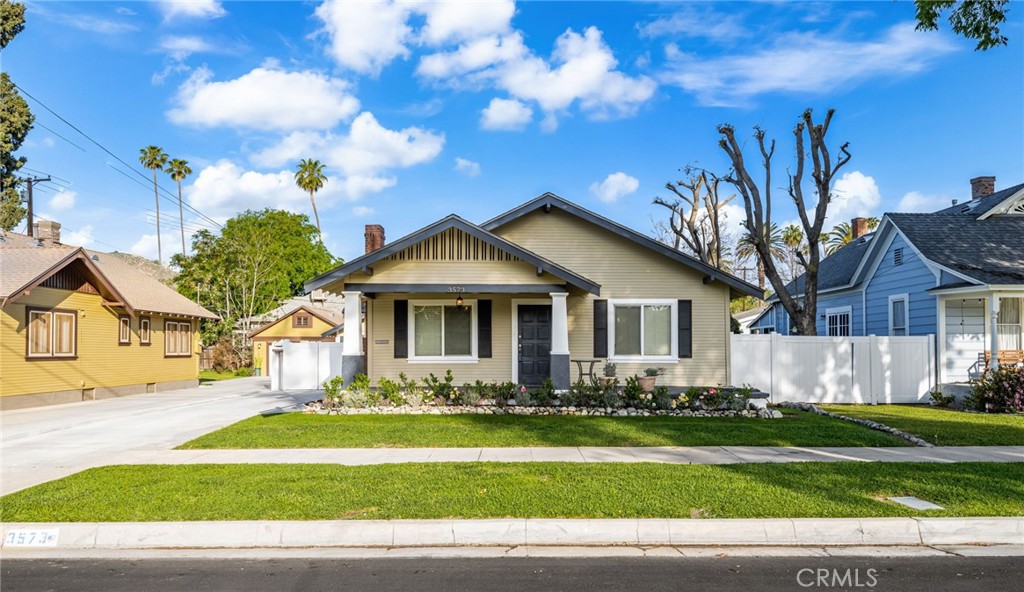 3573 Locust Street Riverside, CA 92501 - Photo 1 of 1 a view of a front of a house with a yard