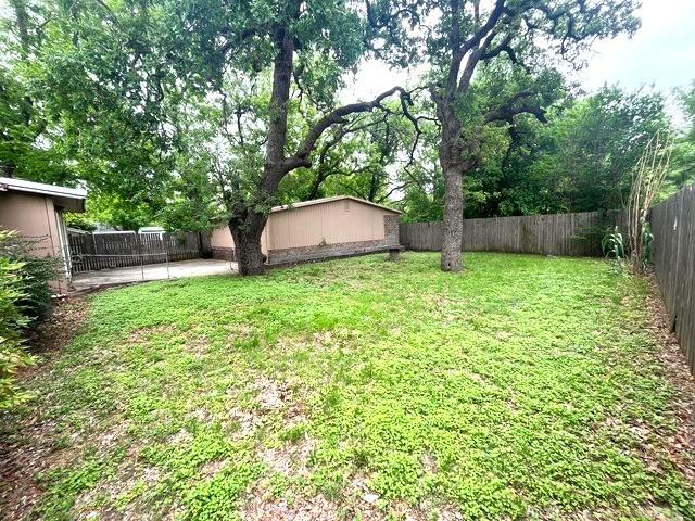 501 West College Street Rising Star, TX 76471 - Photo 14 of 17 a house with a tree in front of it