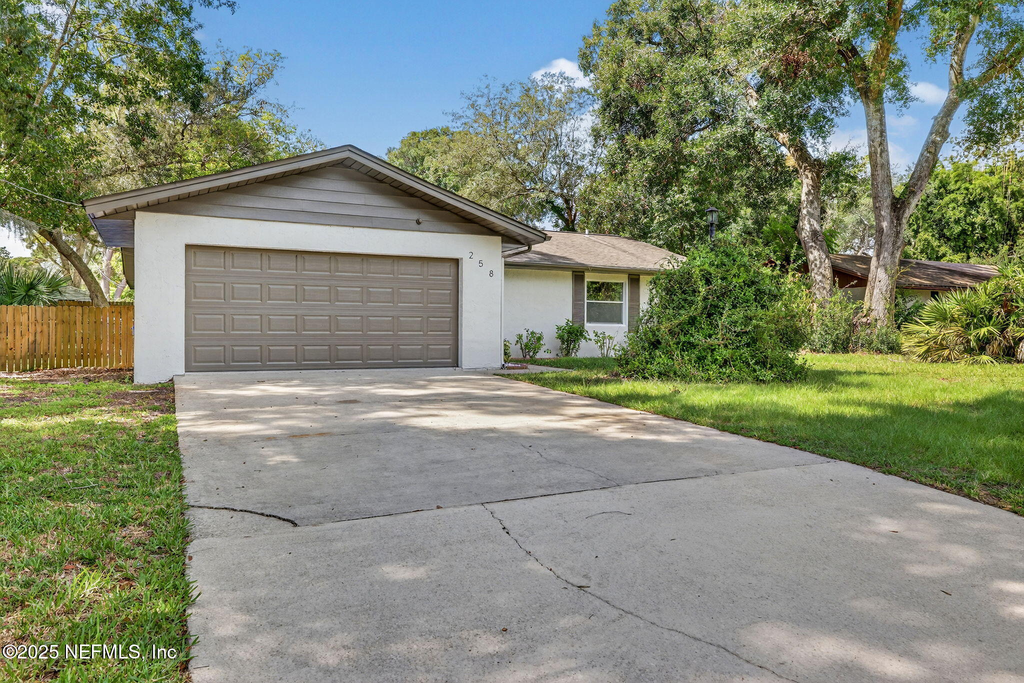 258 Wisteria Road St. Augustine, FL 32086 - Photo 3 of 33 a front view of house with yard and green space