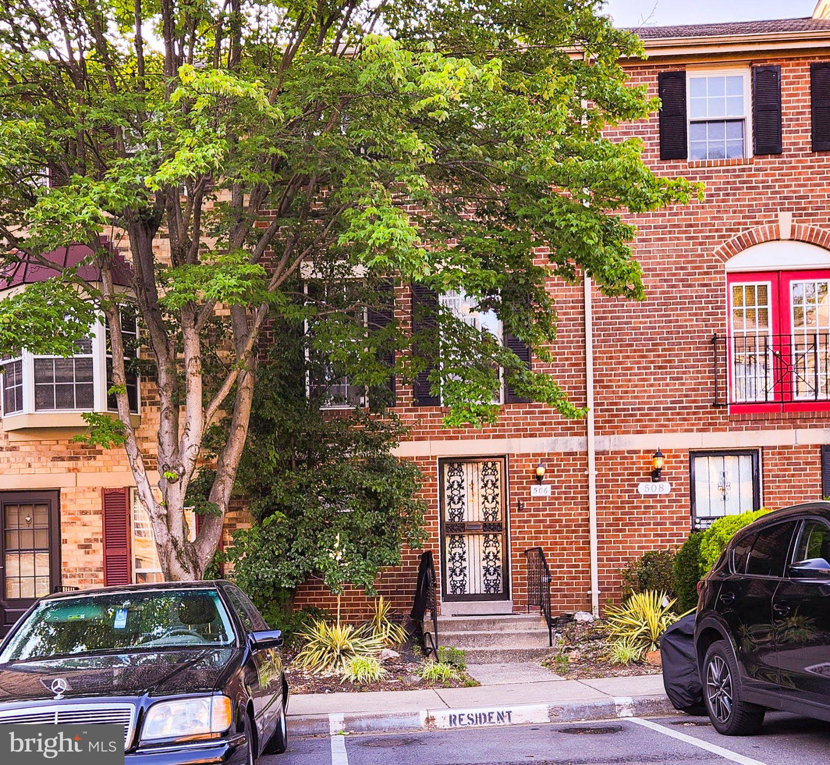 506 Pickwick Village Way Silver Spring, MD 20901 - Photo 1 of 1 Charming brick townhouse with greenery.