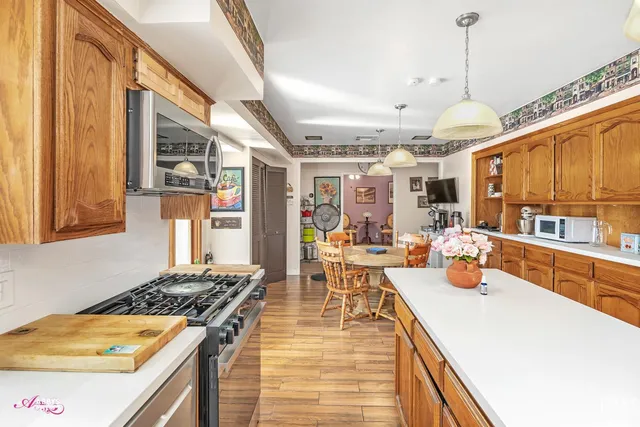 a very nice looking dining room with a large window