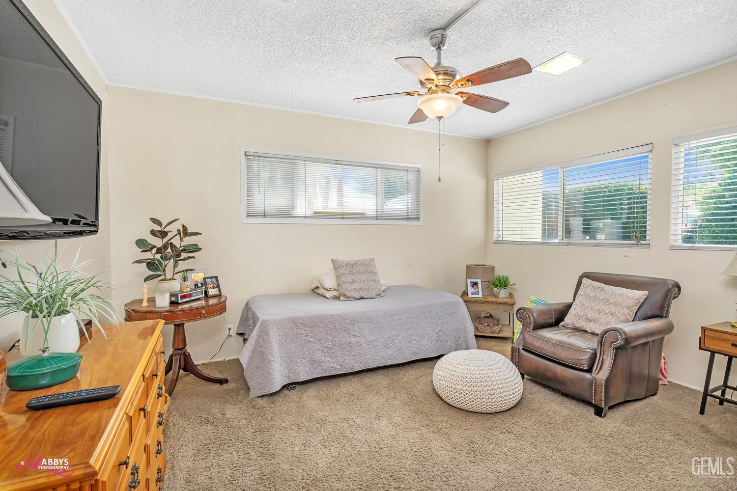 Undisclosed Address Bakersfield, CA 93306 - Photo 26 of 56 a bedroom with furniture and a window