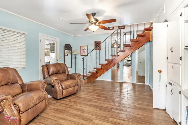 a dining space with a table and chairs