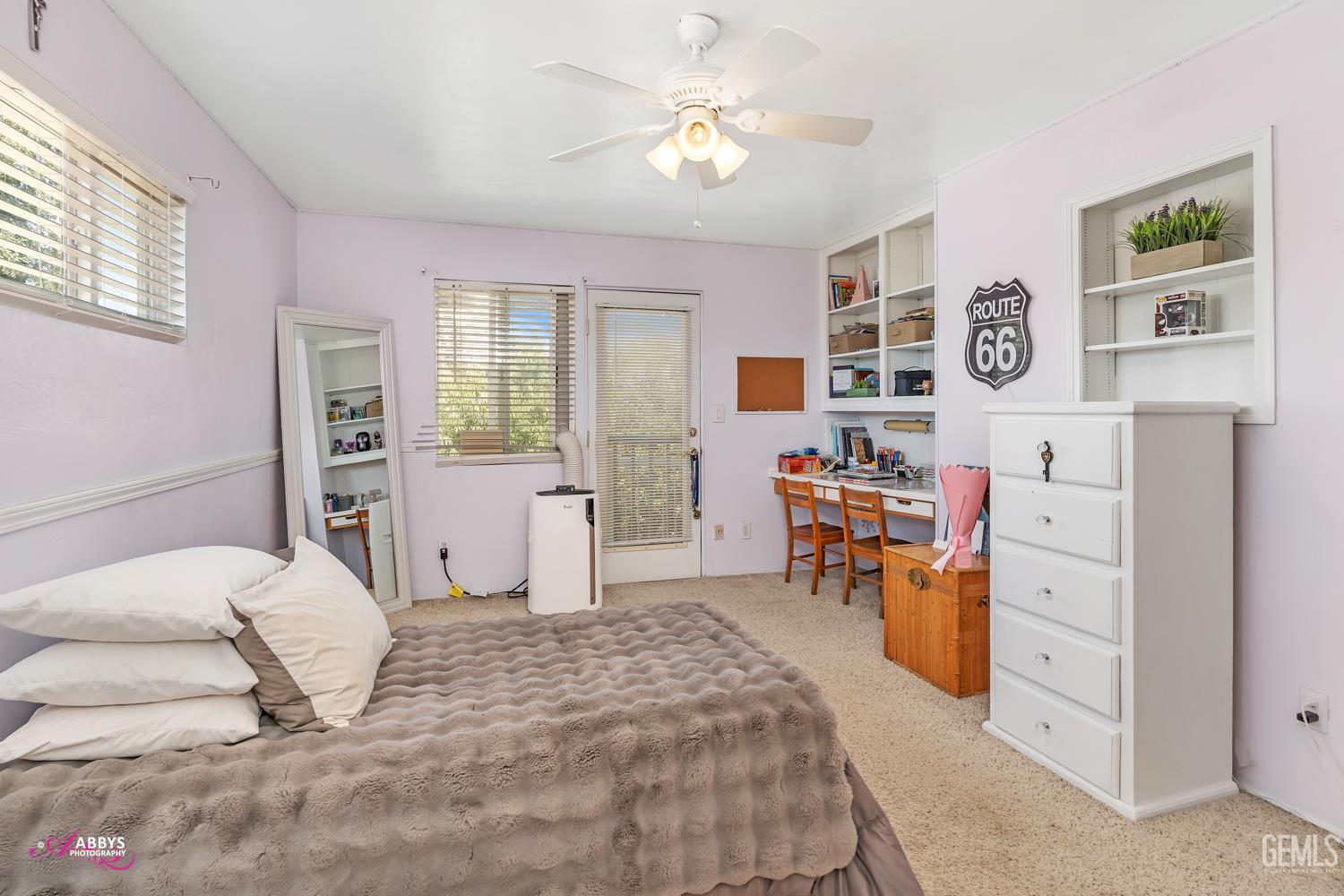 Undisclosed Address Bakersfield, CA 93306 - Photo 34 of 56 a bedroom with furniture and a window