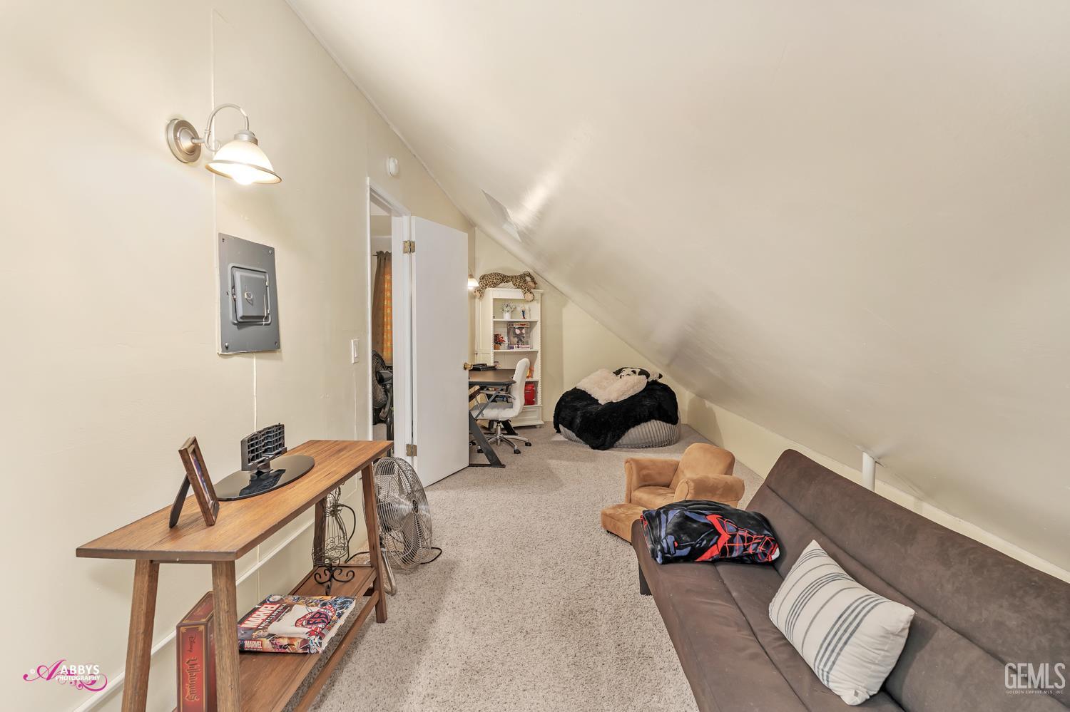 Undisclosed Address Bakersfield, CA 93306 - Photo 35 of 56 a bed room with a bed and a couch