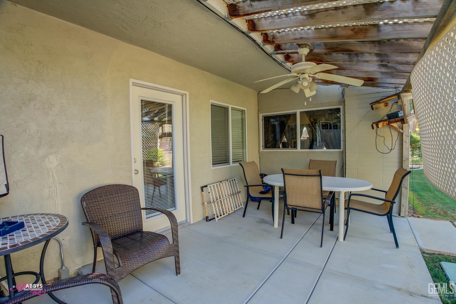 Undisclosed Address Bakersfield, CA 93306 - Photo 51 of 56 a balcony with chairs and a potted plant