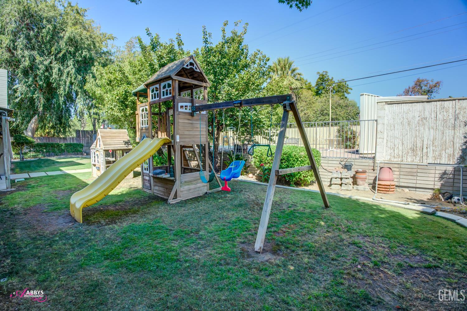 Undisclosed Address Bakersfield, CA 93306 - Photo 52 of 56 a view of a park with a slide