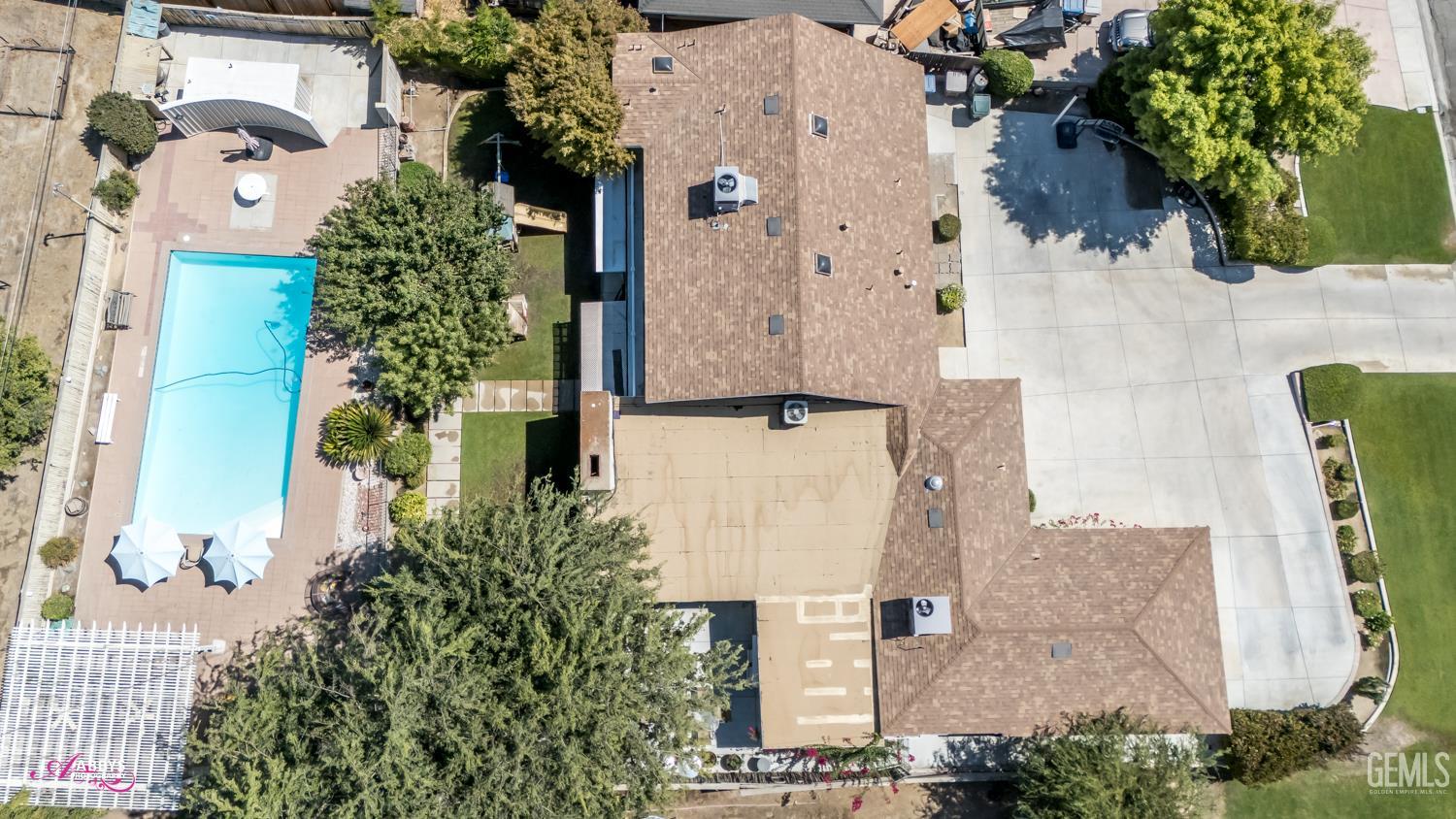 Undisclosed Address Bakersfield, CA 93306 - Photo 56 of 56 an aerial view of residential houses with outdoor space and parking