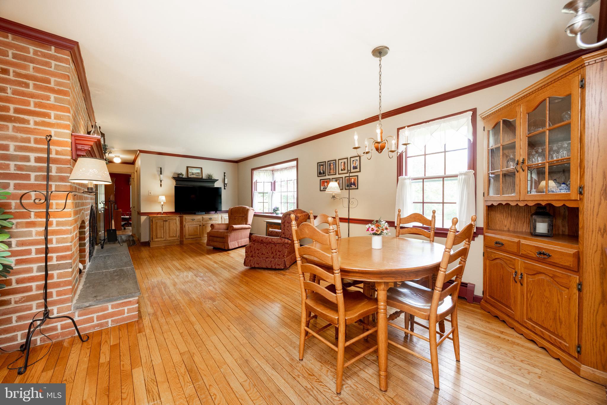 741 Cowpath Road Telford, PA 18969 - Photo 16 of 72 a view of a dining room with furniture window and wooden floor