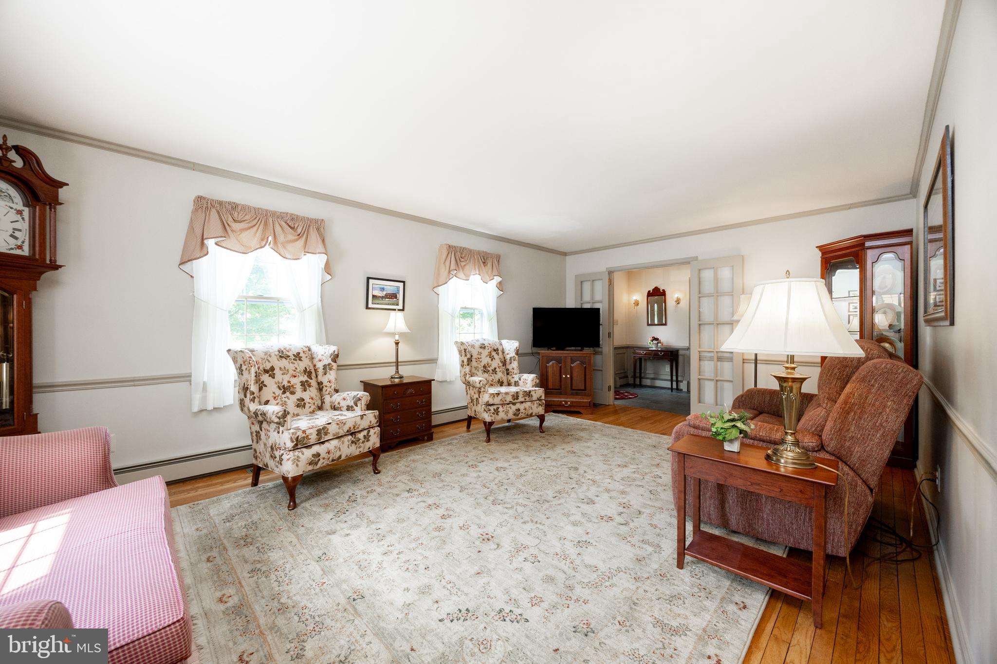 741 Cowpath Road Telford, PA 18969 - Photo 21 of 72 a living room with furniture and a flat screen tv