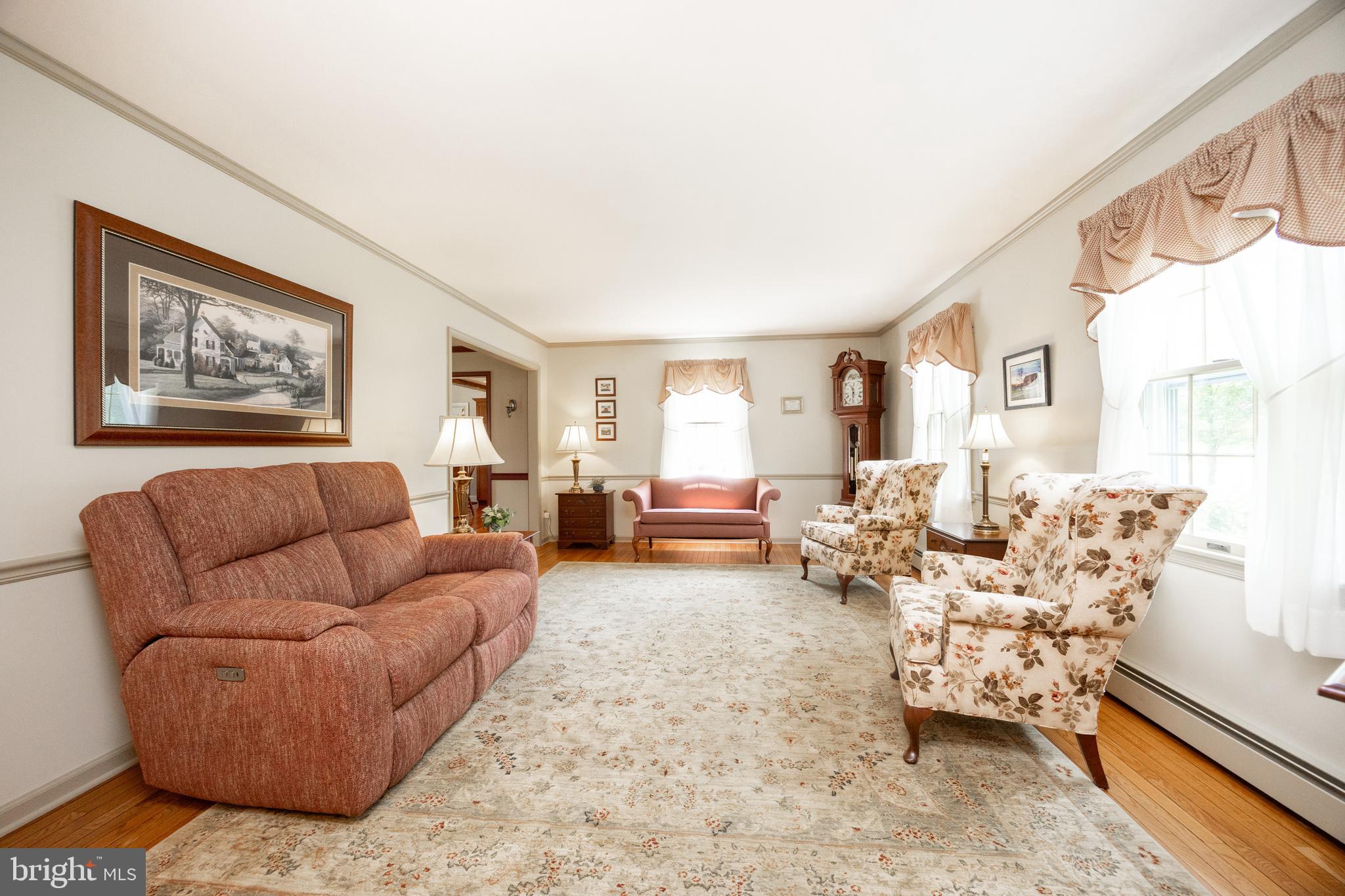741 Cowpath Road Telford, PA 18969 - Photo 22 of 72 a living room with furniture and a window