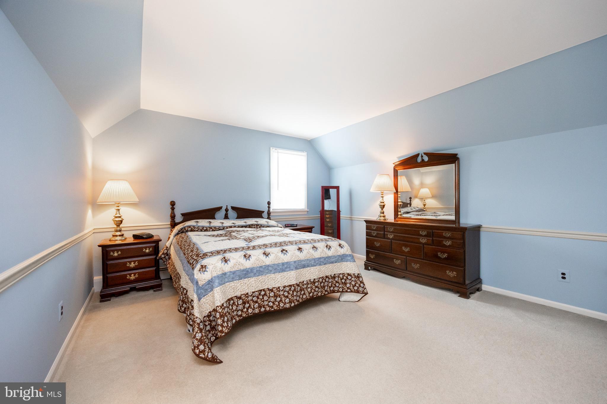741 Cowpath Road Telford, PA 18969 - Photo 29 of 72 a bedroom with a bed and a tv on dresser