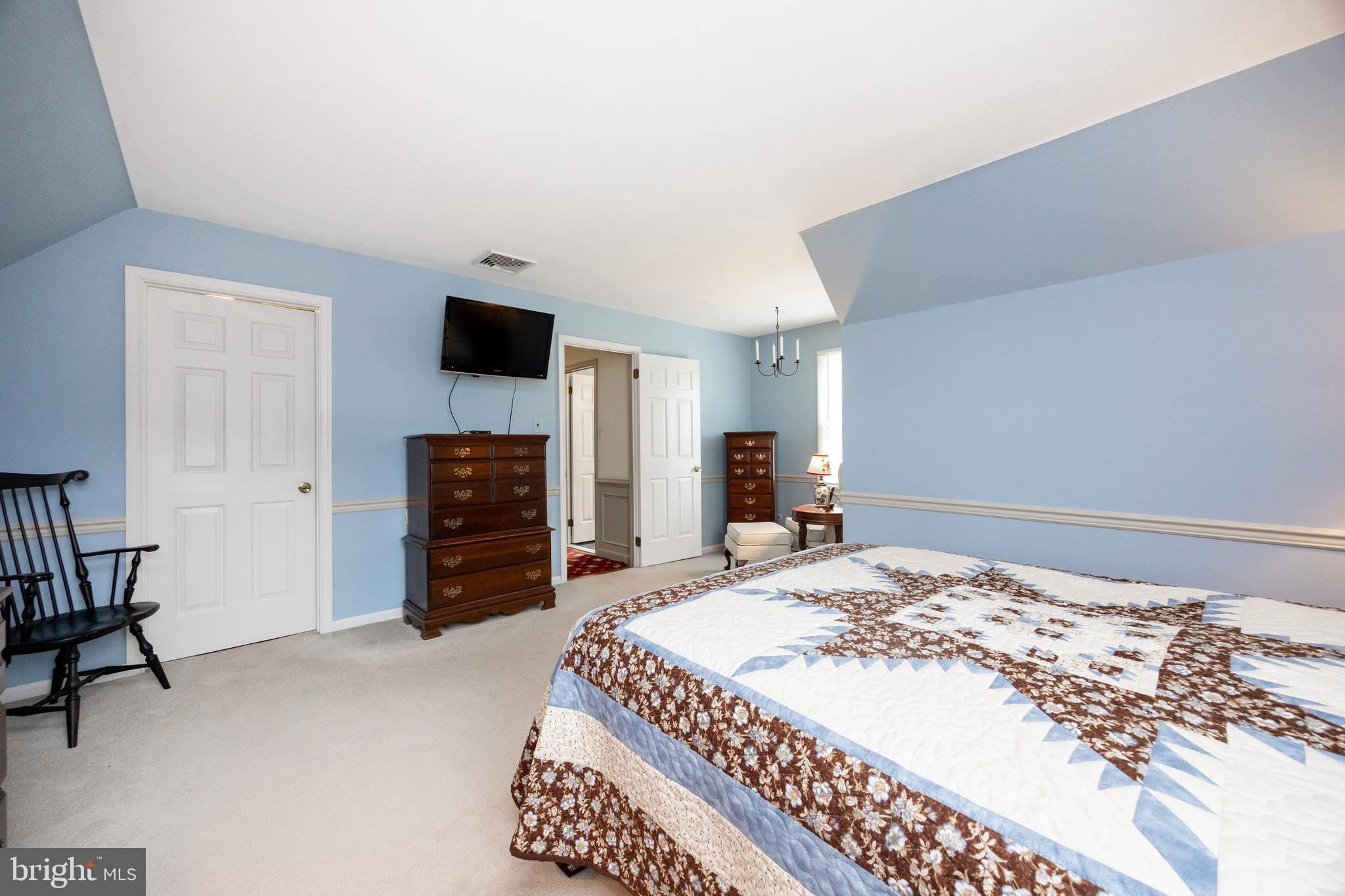 741 Cowpath Road Telford, PA 18969 - Photo 31 of 72 a bedroom with a bed and a television