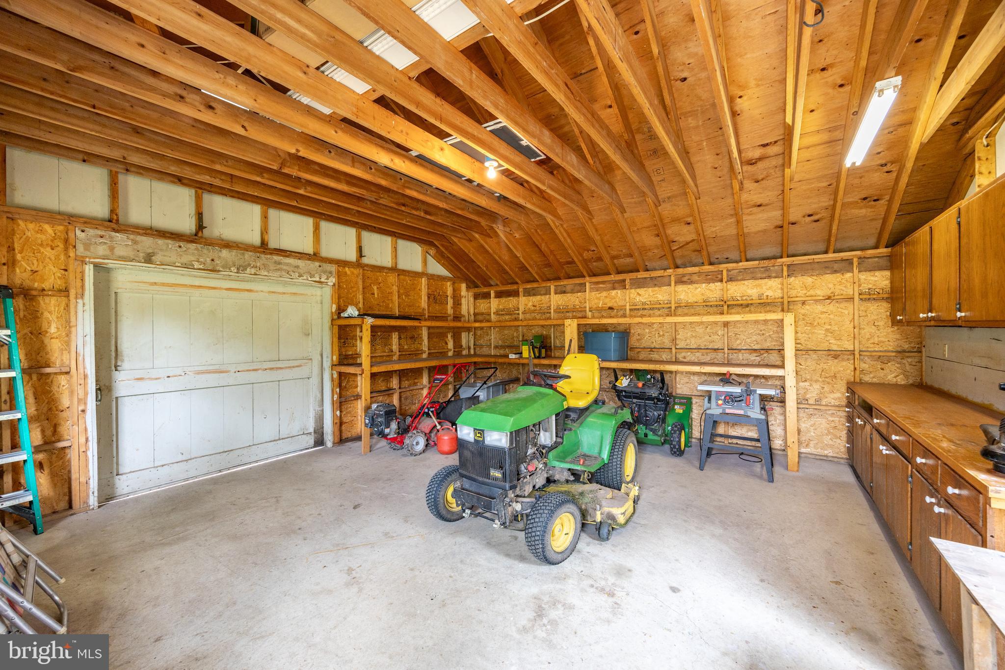 741 Cowpath Road Telford, PA 18969 - Photo 45 of 72 a view of a garage with a table and chairs
