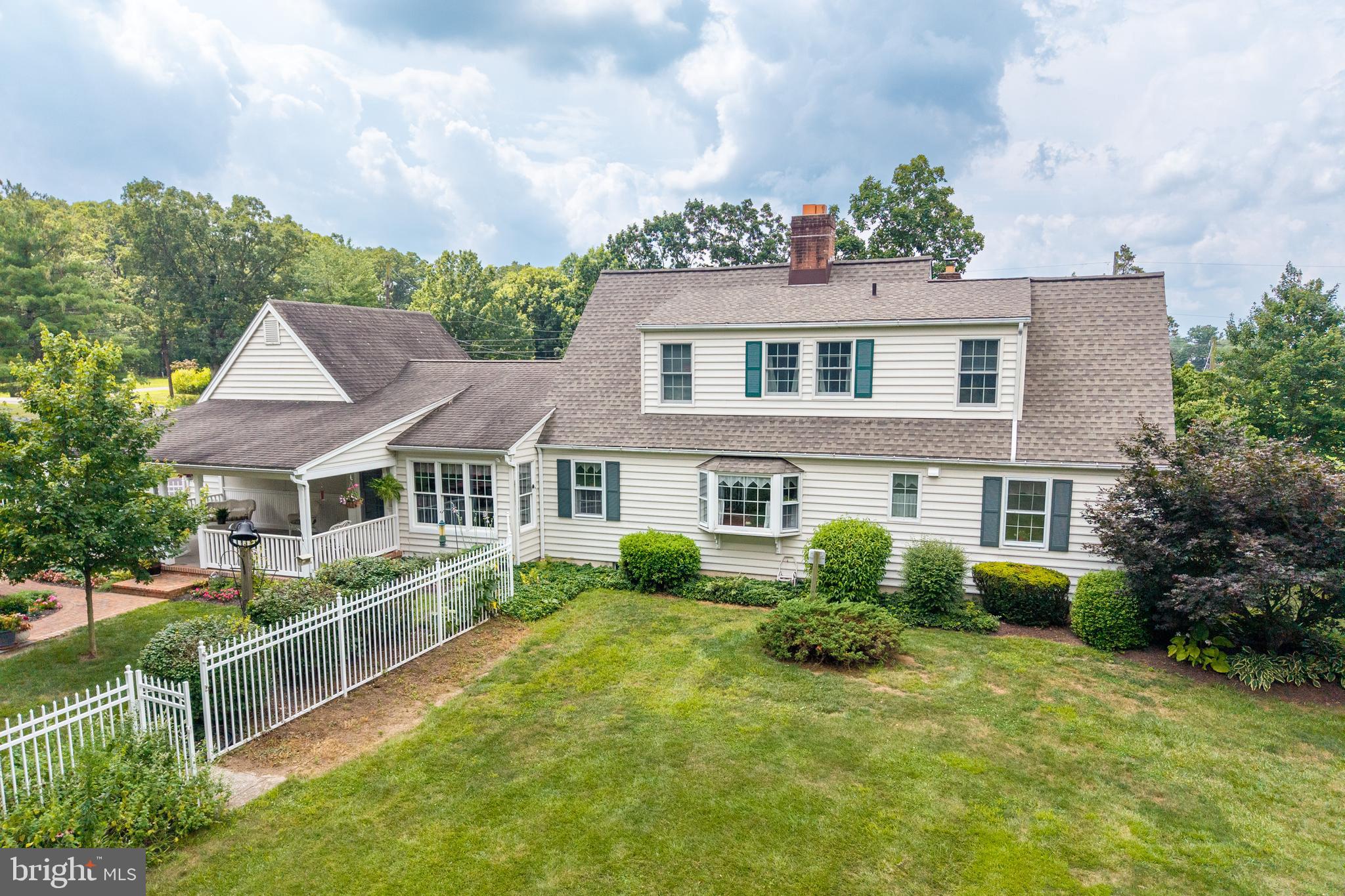 741 Cowpath Road Telford, PA 18969 - Photo 5 of 72 a view of house with a big yard and potted plants
