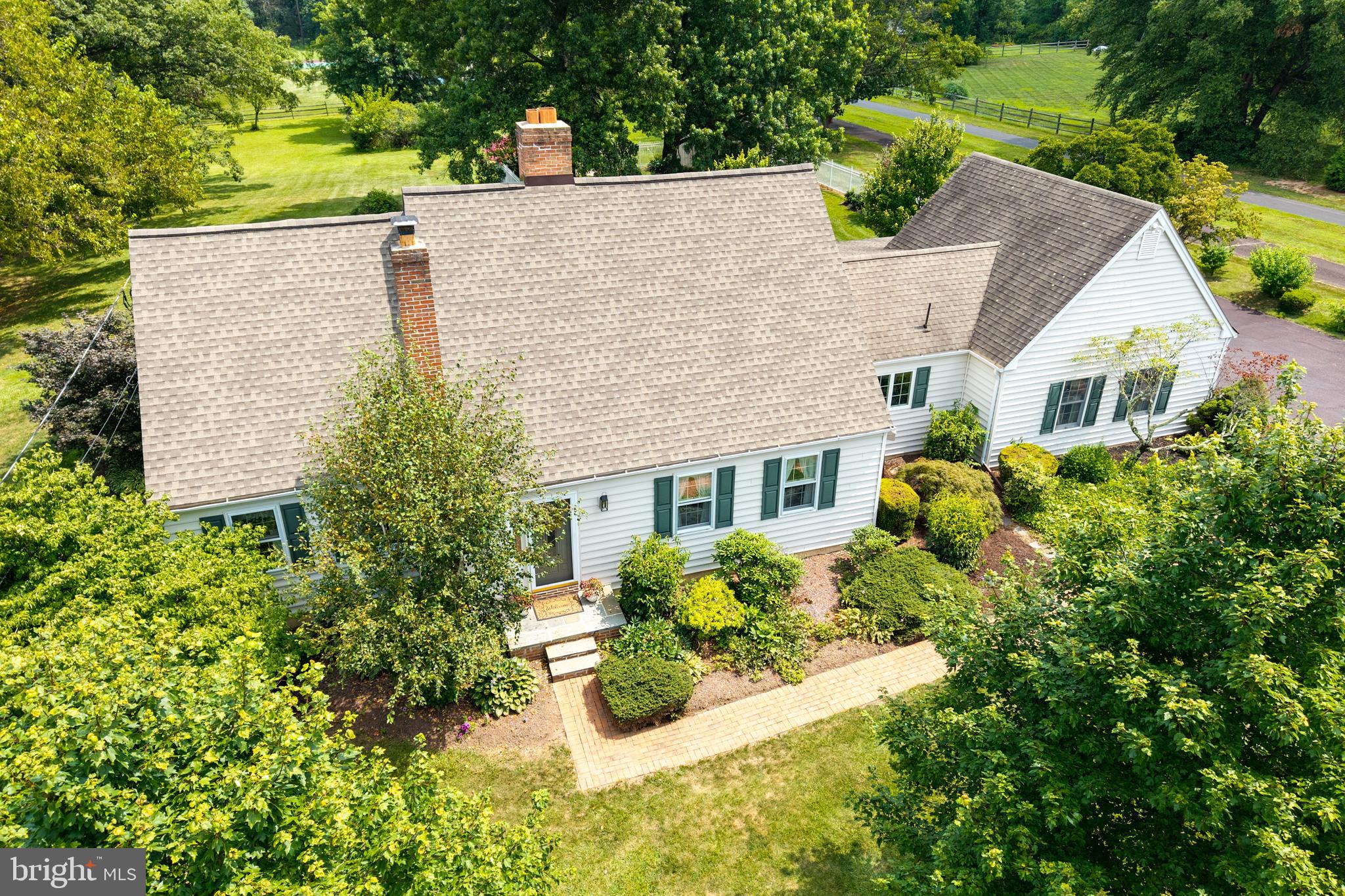 741 Cowpath Road Telford, PA 18969 - Photo 58 of 72 a aerial view of a house with yard and trees in the background