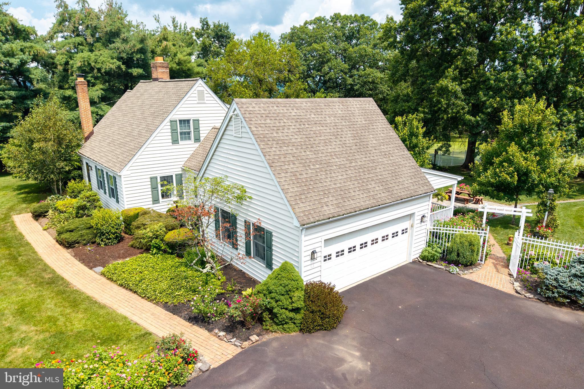 741 Cowpath Road Telford, PA 18969 - Photo 59 of 72 a aerial view of a house with a yard and potted plants