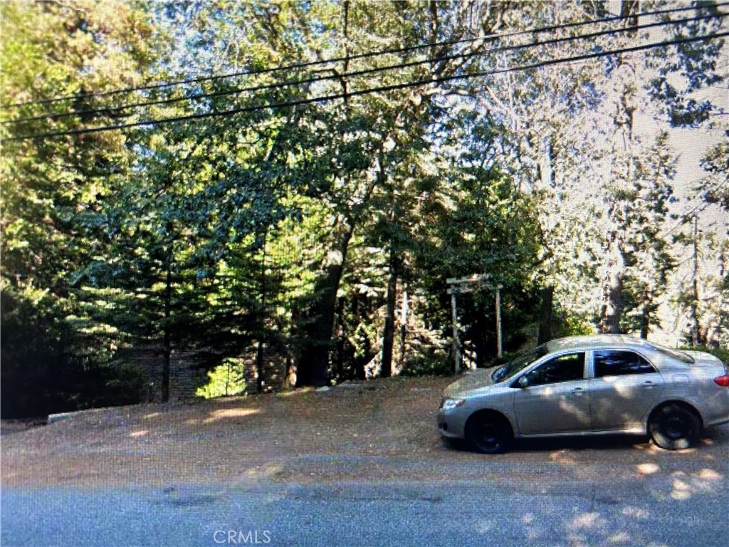 614 Arrowhead Villa Road Lake Arrowhead, CA 92352 - Photo 9 of 9 a car parked on the side of the road