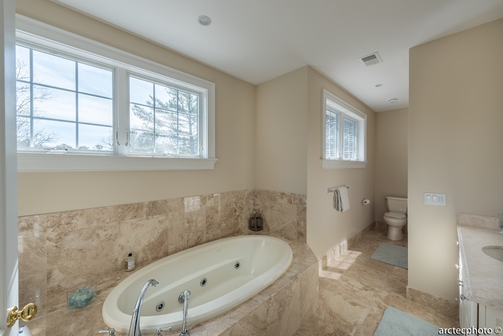 44 Pleasant Park Drive Mashpee, MA 02649 - Photo 13 of 14 a bathroom with a bathtub and a toilet