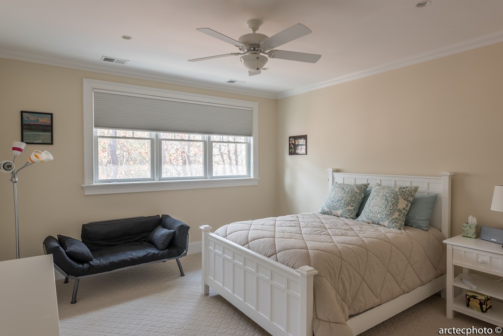 44 Pleasant Park Drive Mashpee, MA 02649 - Photo 10 of 14 a bedroom with a bed and a couch