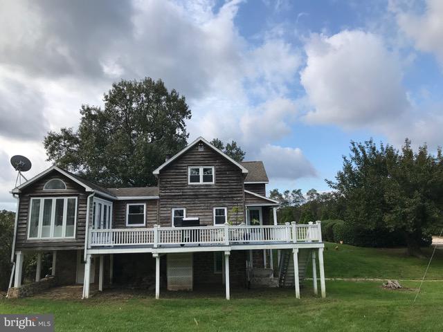 4627 Steltz Road New Freedom, PA 17349 - Photo 4 of 29 Rear view of home with Full Deck