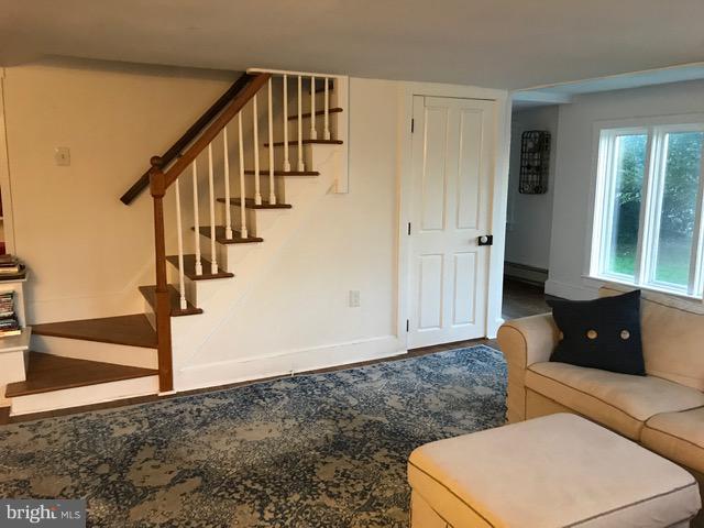 4627 Steltz Road New Freedom, PA 17349 - Photo 9 of 29 Stairs in LIvingroom lead to Upstairs Bedrooms/BA