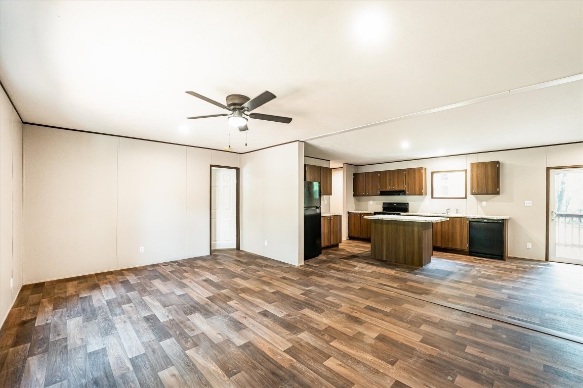 16465 Hickory Road Conroe, TX 77302 - Photo 17 of 42 a view of a kitchen with wooden floor and a sink