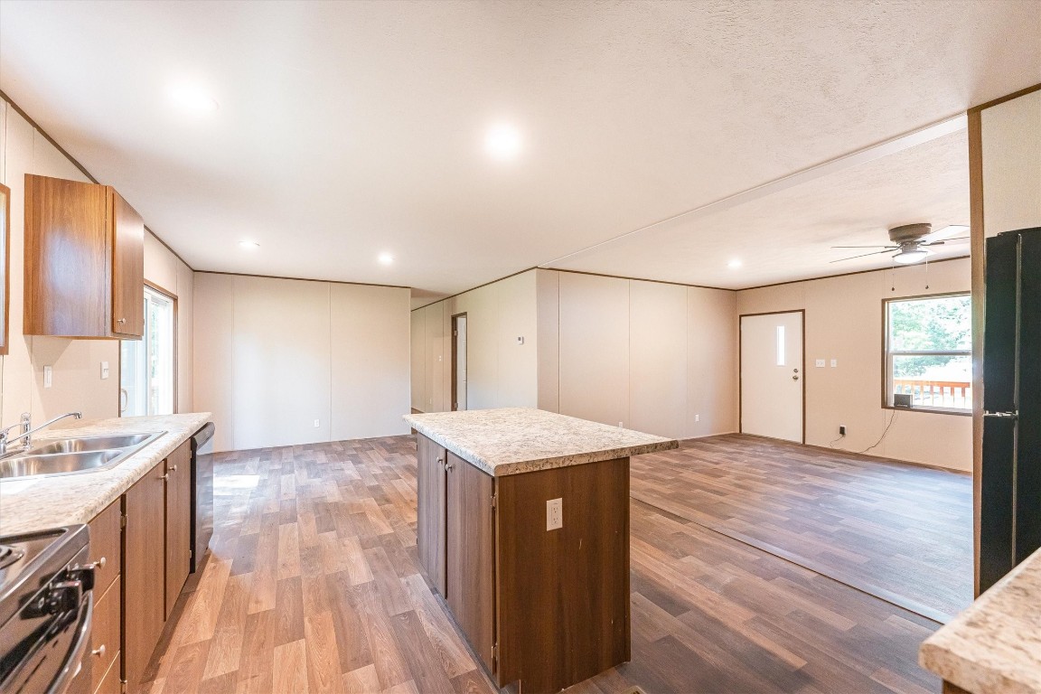 16465 Hickory Road Conroe, TX 77302 - Photo 23 of 42 a view of a kitchen cabinets a sink and wooden floor