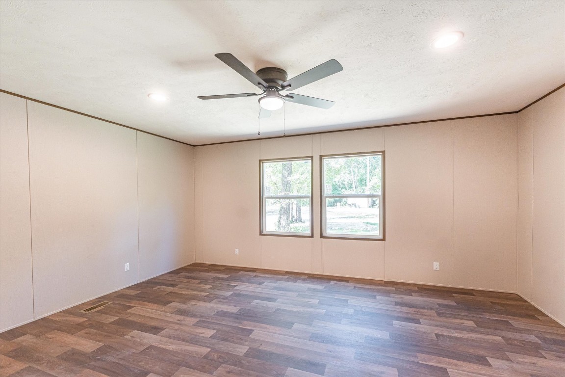 16465 Hickory Road Conroe, TX 77302 - Photo 33 of 42 wooden floor in an empty room with a window
