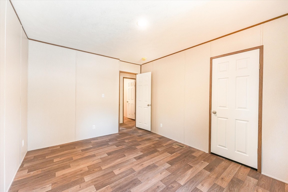 16465 Hickory Road Conroe, TX 77302 - Photo 38 of 42 a view of a room with wooden floor