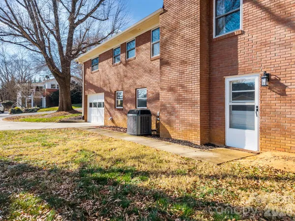 a view of a house with a snow in the yard