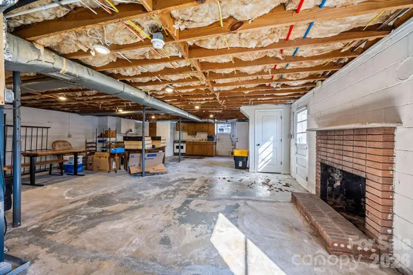 a view of room with furniture and wooden floor
