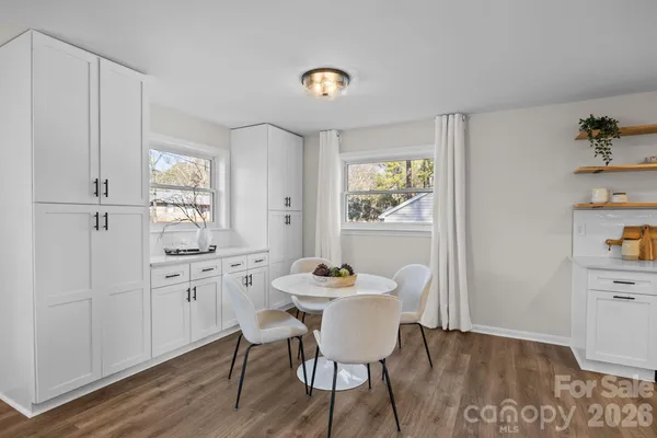a kitchen with stainless steel appliances a refrigerator stove and sink