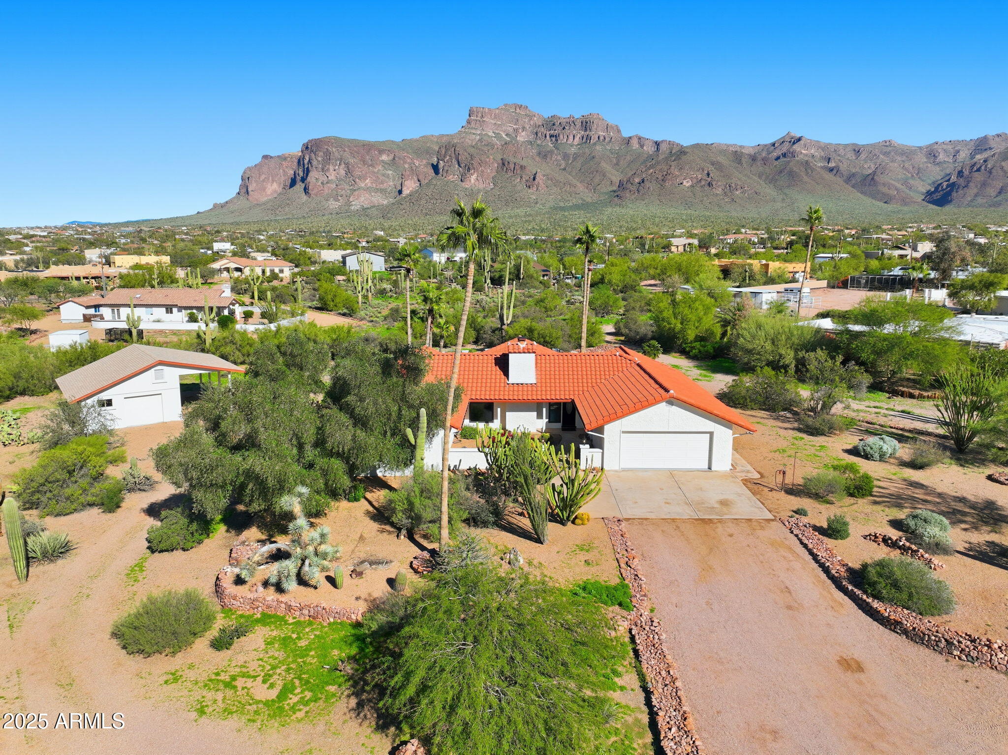 5810 East 14th Avenue Apache Junction, AZ 85119 - Photo 1 of 38 an aerial view of residential houses and outdoor space