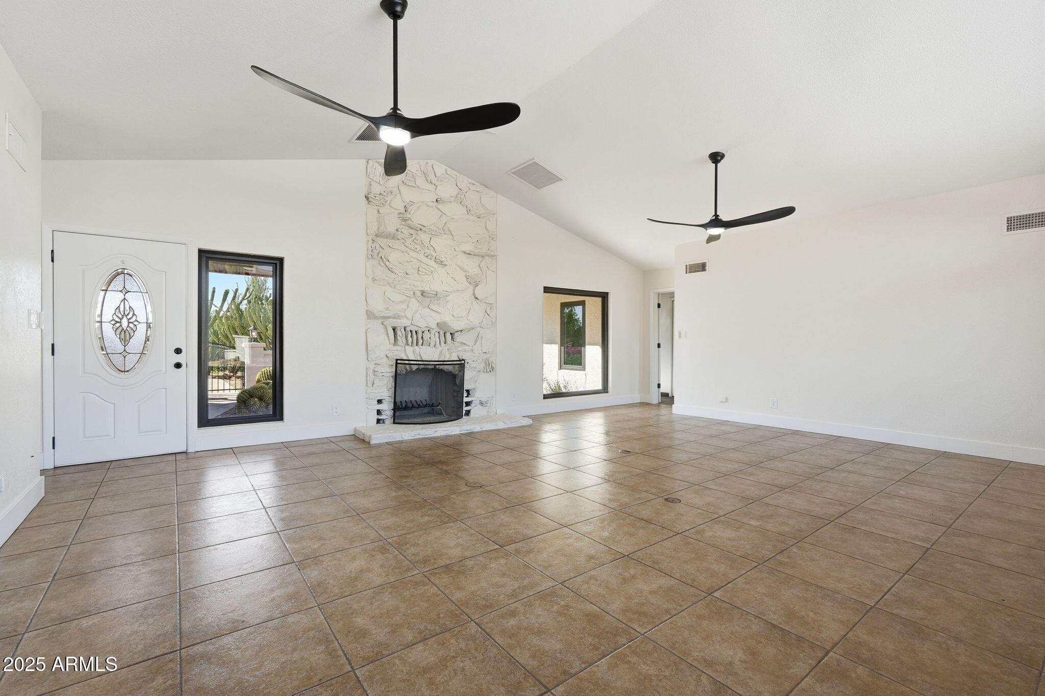 5810 East 14th Avenue Apache Junction, AZ 85119 - Photo 11 of 38 a view of an empty room with a window