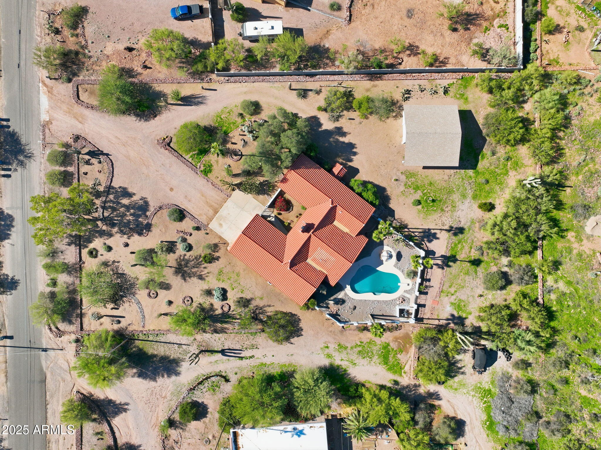 5810 East 14th Avenue Apache Junction, AZ 85119 - Photo 2 of 38 an aerial view of a house with a lake view