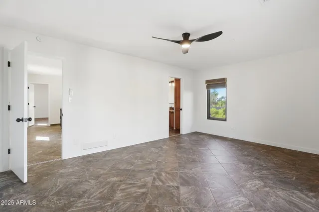 a view of an empty room and window