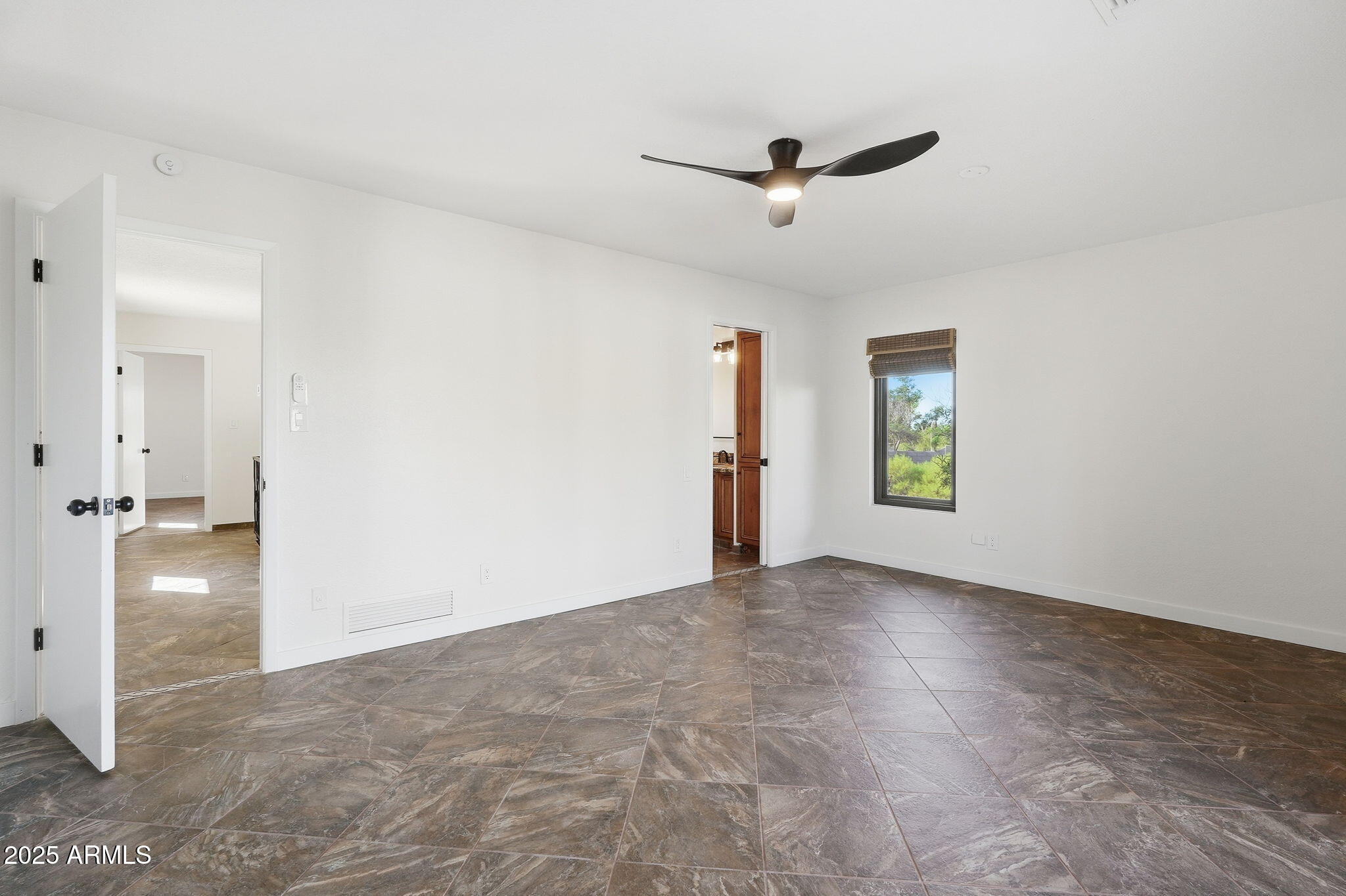 5810 East 14th Avenue Apache Junction, AZ 85119 - Photo 22 of 38 a view of an empty room and window