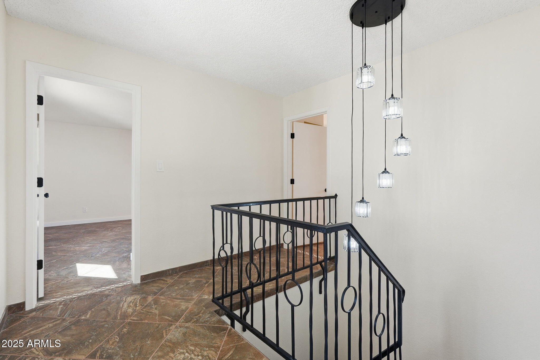 5810 East 14th Avenue Apache Junction, AZ 85119 - Photo 28 of 38 a view of a hallway with wooden floor and a window
