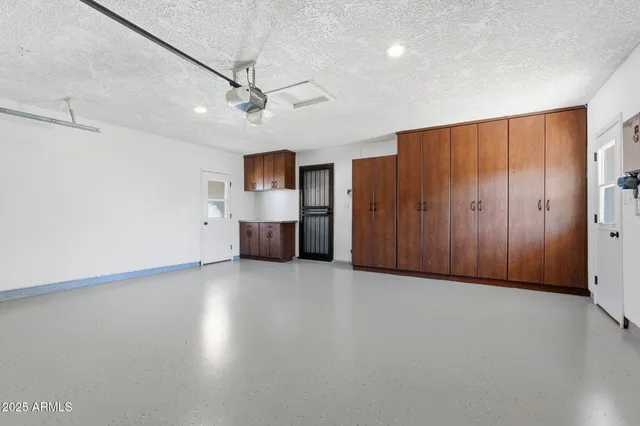 a view of a kitchen with a dishwasher and a refrigerator