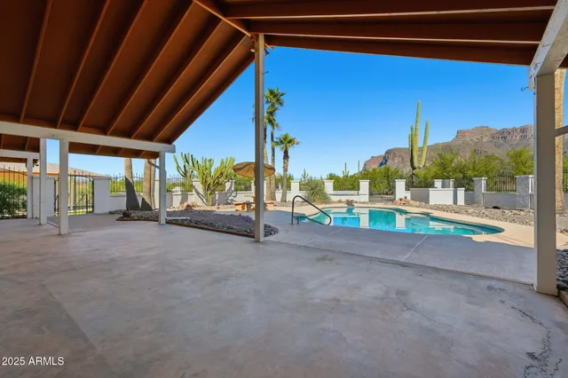 a view of a house with porch and a garage