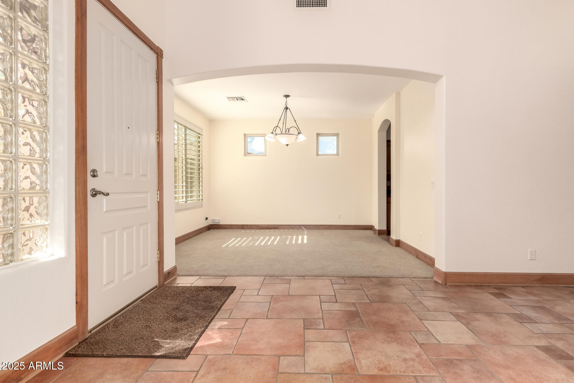 5902 West Gambit Trail Phoenix, AZ 85083 - Photo 33 of 62 a view of a hallway with closet and window