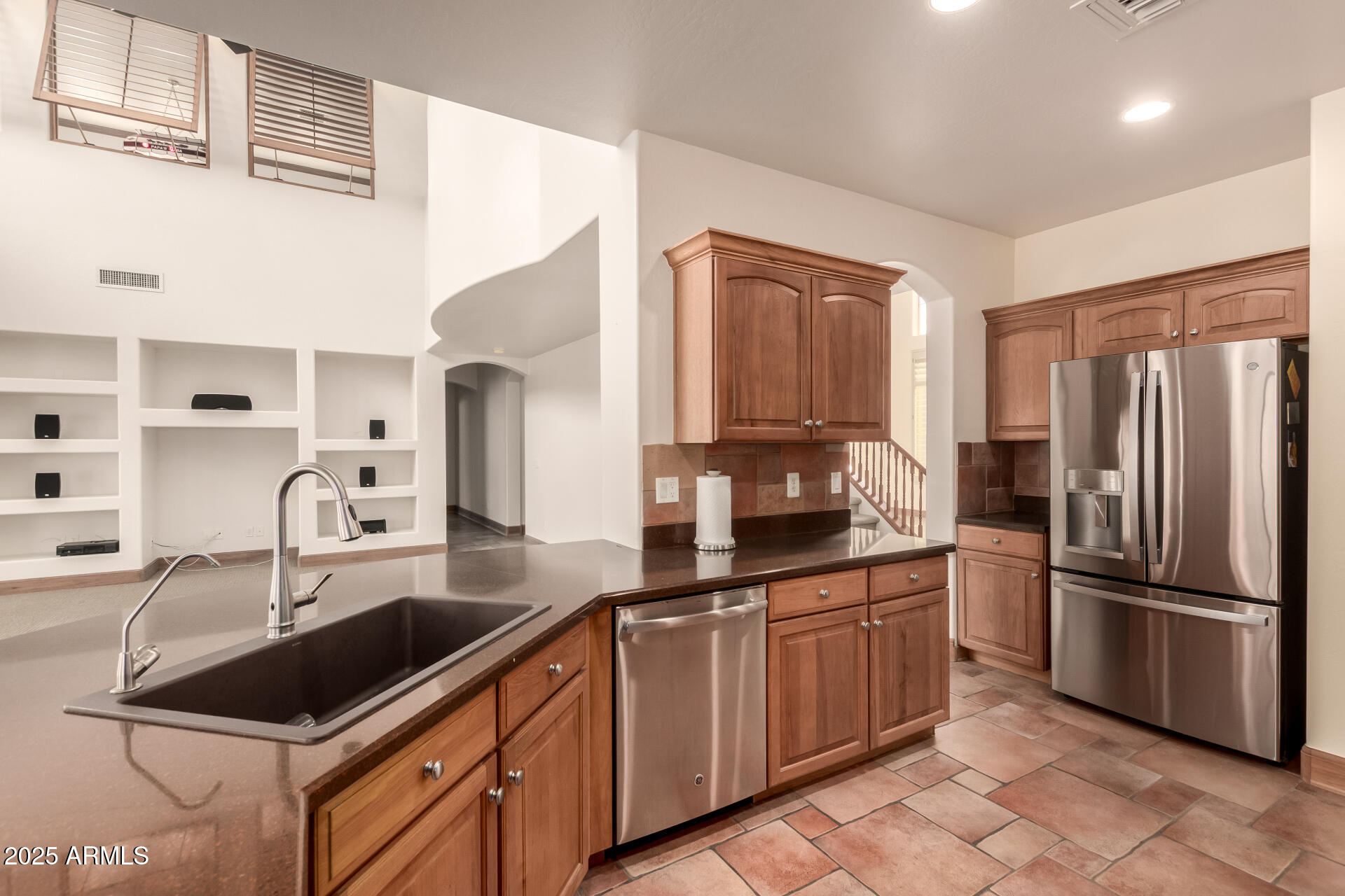 5902 West Gambit Trail Phoenix, AZ 85083 - Photo 6 of 62 a kitchen with granite countertop a sink stove and refrigerator