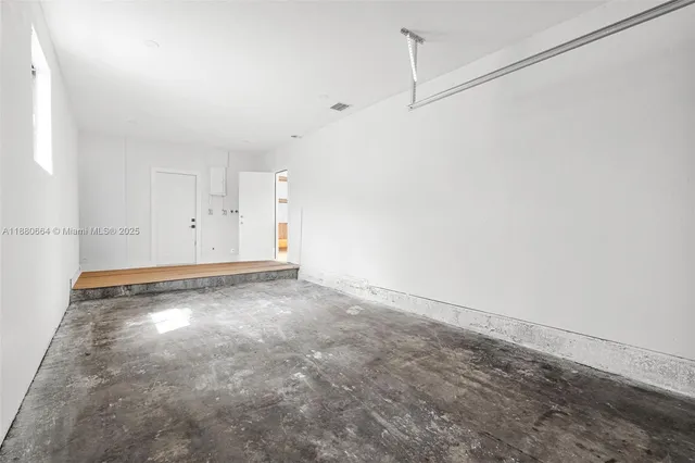 a view of a room with an empty space