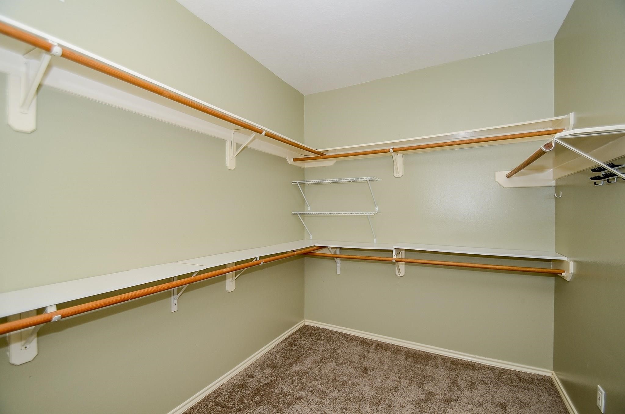 23719 Tustin Ranch Court Katy, TX 77494 - Photo 21 of 31 a close up view of racks on the wall