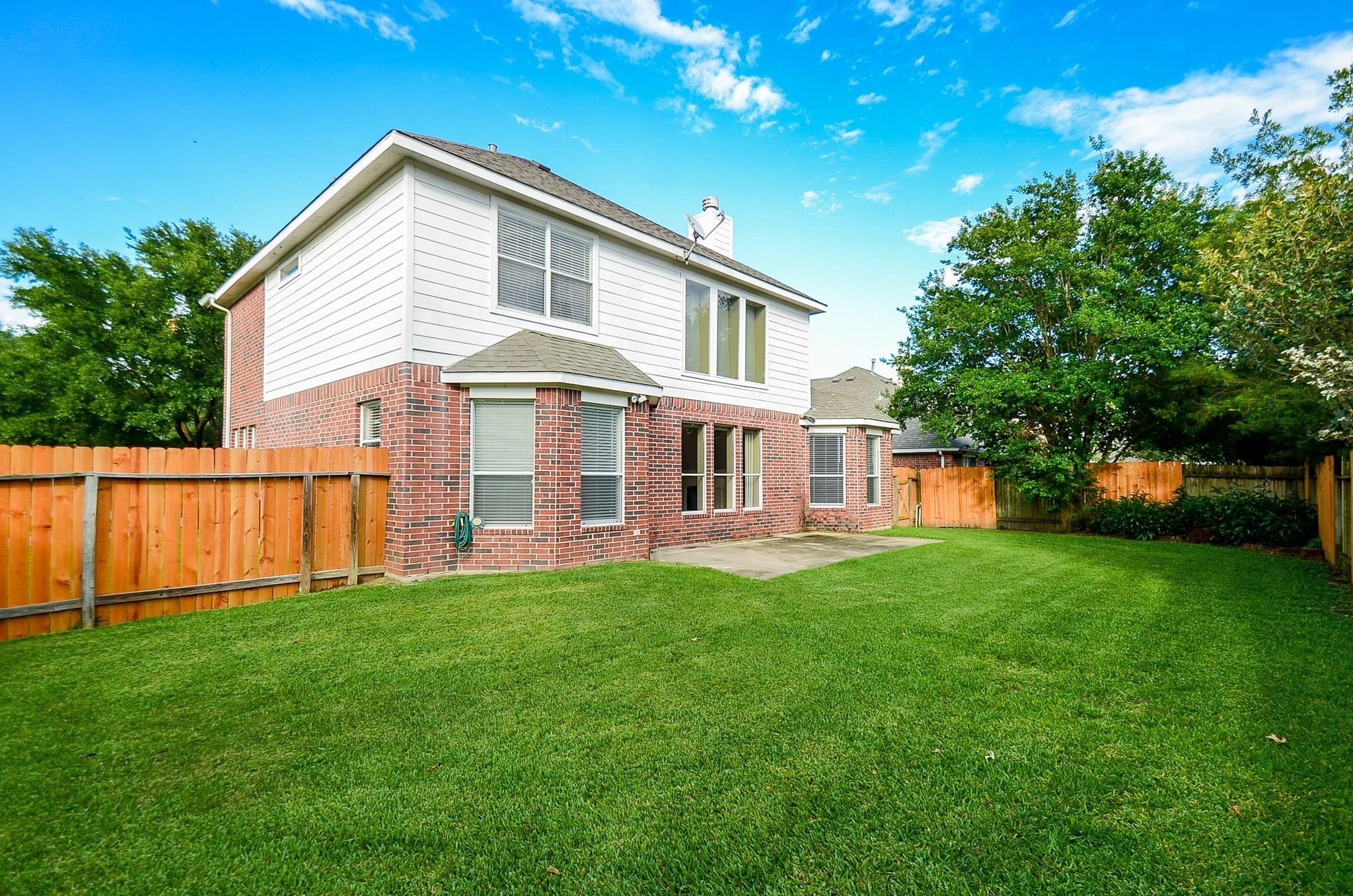 23719 Tustin Ranch Court Katy, TX 77494 - Photo 30 of 31 a front view of a house with a yard