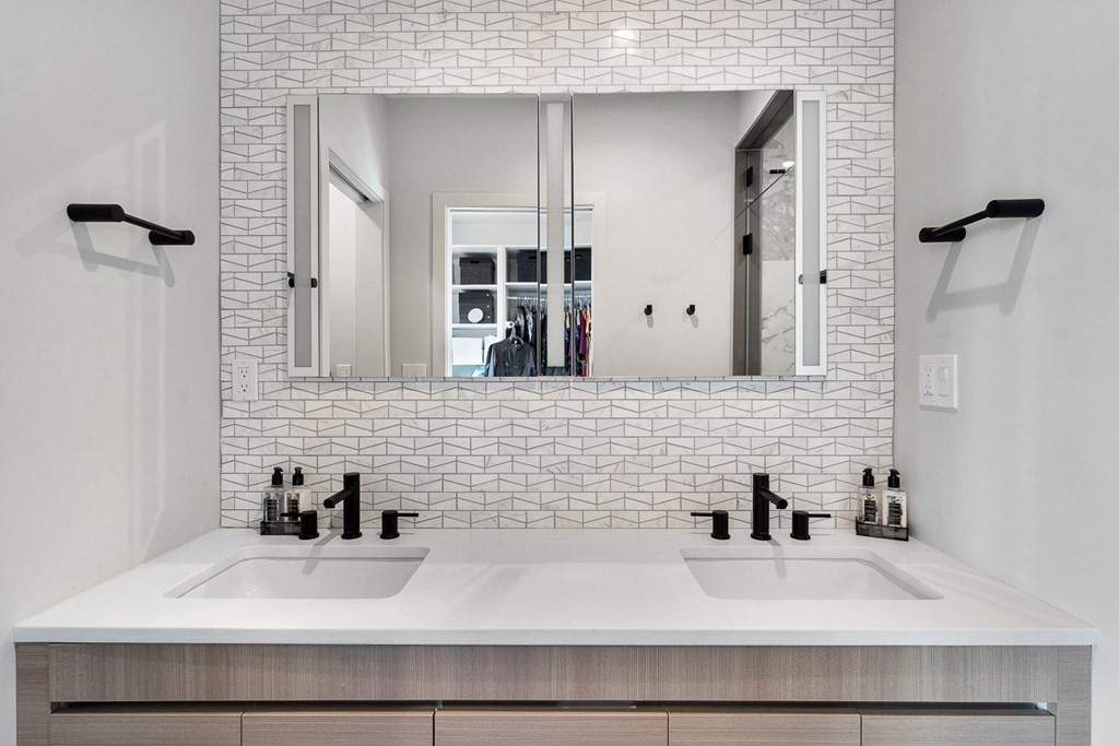 100 A Street, Unit 4 Boston, MA 02127 - Photo 21 of 42 a bathroom with a sink and a mirror