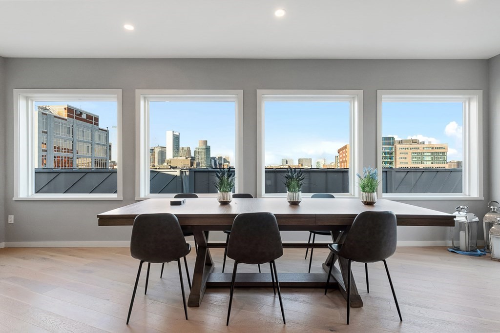 100 A Street, Unit 4 Boston, MA 02127 - Photo 41 of 42 a dining room with furniture and large windows